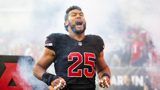 Arizona Cardinals linebacker Zaven Collins (25) reacts against the Los Angeles Rams at State Farm Stadium.